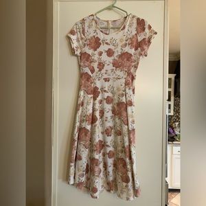 Women’s small dress. 14.5 inch waist and can stretch larger. 40” length.